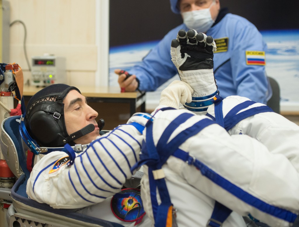Expedition 63 crewmember Anatoly Ivanishin of Roscosmos has his Sokol suit pressure checked ahead of his launch on a Soyuz rocket with Ivan Vagner of Roscosmos, and Chris Cassidy of NASA, Thursday, April 9, 2020 at the Baikonur Cosmodrome in Kazakhstan. A few hours later, they lifted off for a six-and-a-half month mission on the International Space Station.