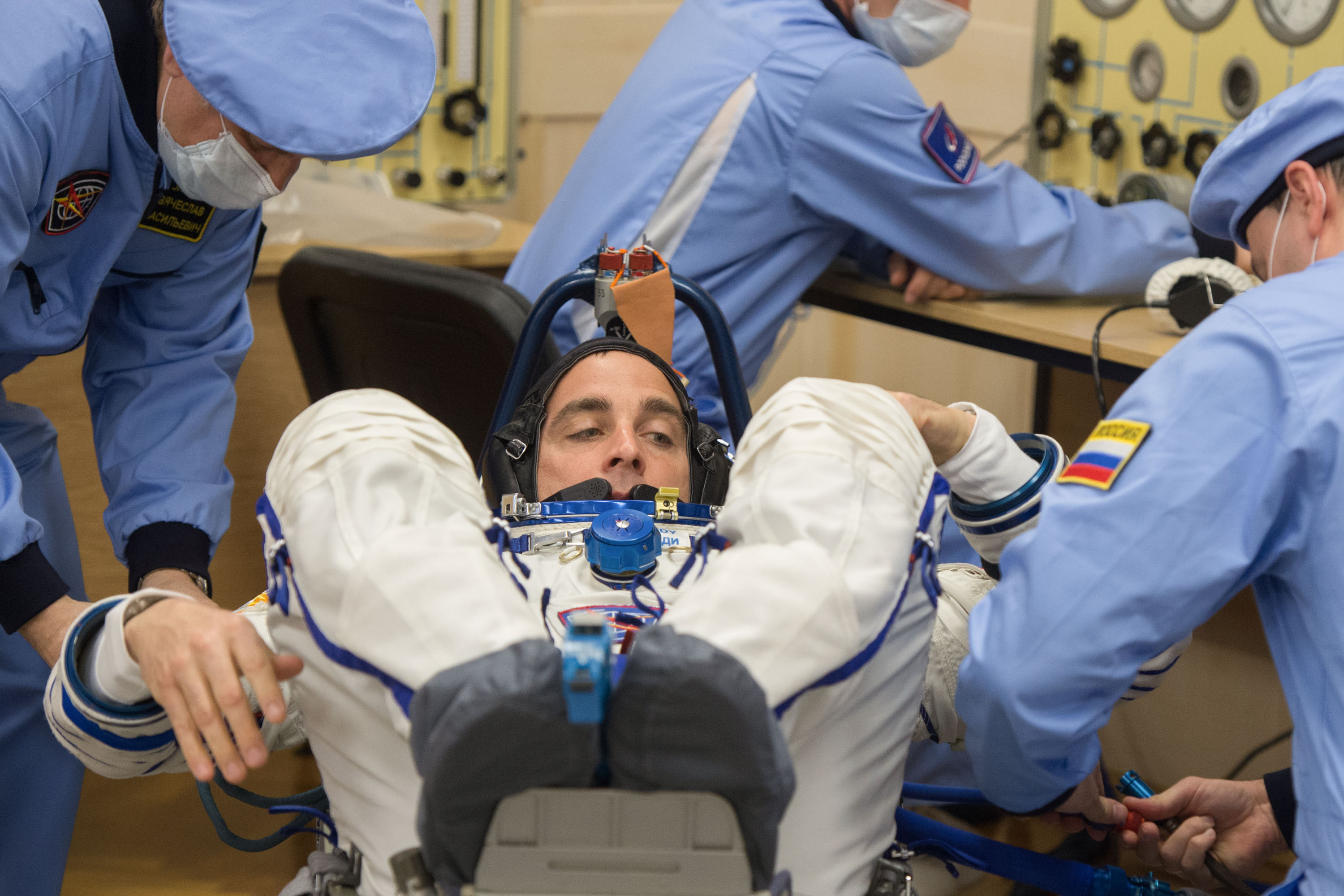Expedition 63 crewmember Chris Cassidy of NASA has his Sokol suit pressure checked ahead of his launch on a Soyuz rocket with Anatoly Ivanishin and Ivan Vagner of Roscosmos, Thursday, April 9, 2020 at the Baikonur Cosmodrome in Kazakhstan. A few hours later, Vagner, Anatoly Ivanishin of Roscosmos, and Chris Cassidy of NASA lifted off for a six-and-a-half month mission on the International Space Station.