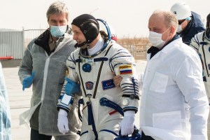 Expedition 63 crewmember Ivan Vagner of Roscosmos walks to board the Soyuz rocket prior to launch with Anatoly Ivanishin of Roscosmos and Chris Cassidy of NASA, Thursday, April 9, 2020 at the Baikonur Cosmodrome in Kazakhstan. A few hours later, the trio lifted off on a Soyuz rocket for a six-and-a-half month mission on the International Space Station.