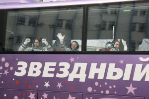 Expedition 63 crewmember Chris Cassidy of NASA, left, waves farewell as he, Anatoly Ivanishin and Ivan Vagner of Roscosmos depart for the launch pad, Thursday, April 9, 2020 at the Baikonur Cosmodrome in Kazakhstan. A few hours later, they lifted off on a Soyuz rocket for a six-and-a-half month mission on the International Space Station.