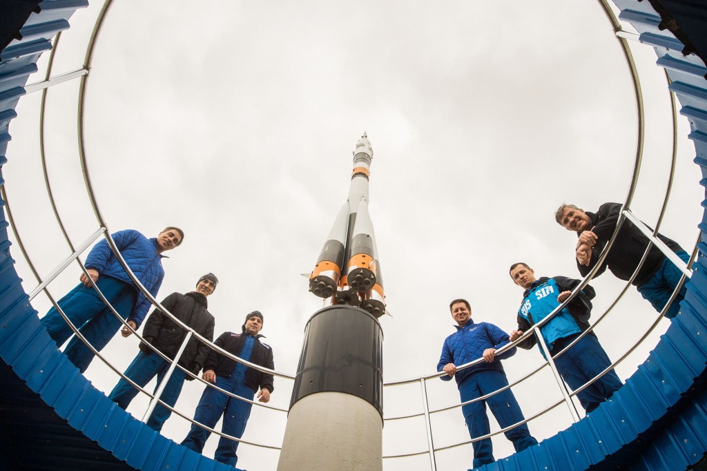 At the Cosmonaut Hotel crew quarters in Baikonur, Kazakhstan, Expedition 63 prime and backup crewmembers pose for pictures April 1 as part of pre-launch activities. From left to right are prime crewmembers Chris Cassidy of NASA and Anatoly Ivanishin and Ivan Vagner of Roscosmos and backup crewmembers Andrei Babkin and Sergey Ryzhikov of Roscosmos and Steve Bowen of NASA. Vagner, Ivanishin and Cassidy will launch April 9 on the Soyuz MS-16 spacecraft from the Baikonur Cosmodrome in Kazakhstan for a six-and-a-half month mission on the International Space Station.