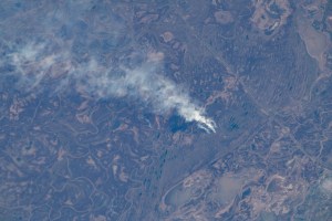 Victoria, Argentina (lower right), pictured from the International Space Station, is located on the eastern edge of the Parana River floodplain. Smoke like this is typical of Argentina and comes from either natural or man-made fires.
