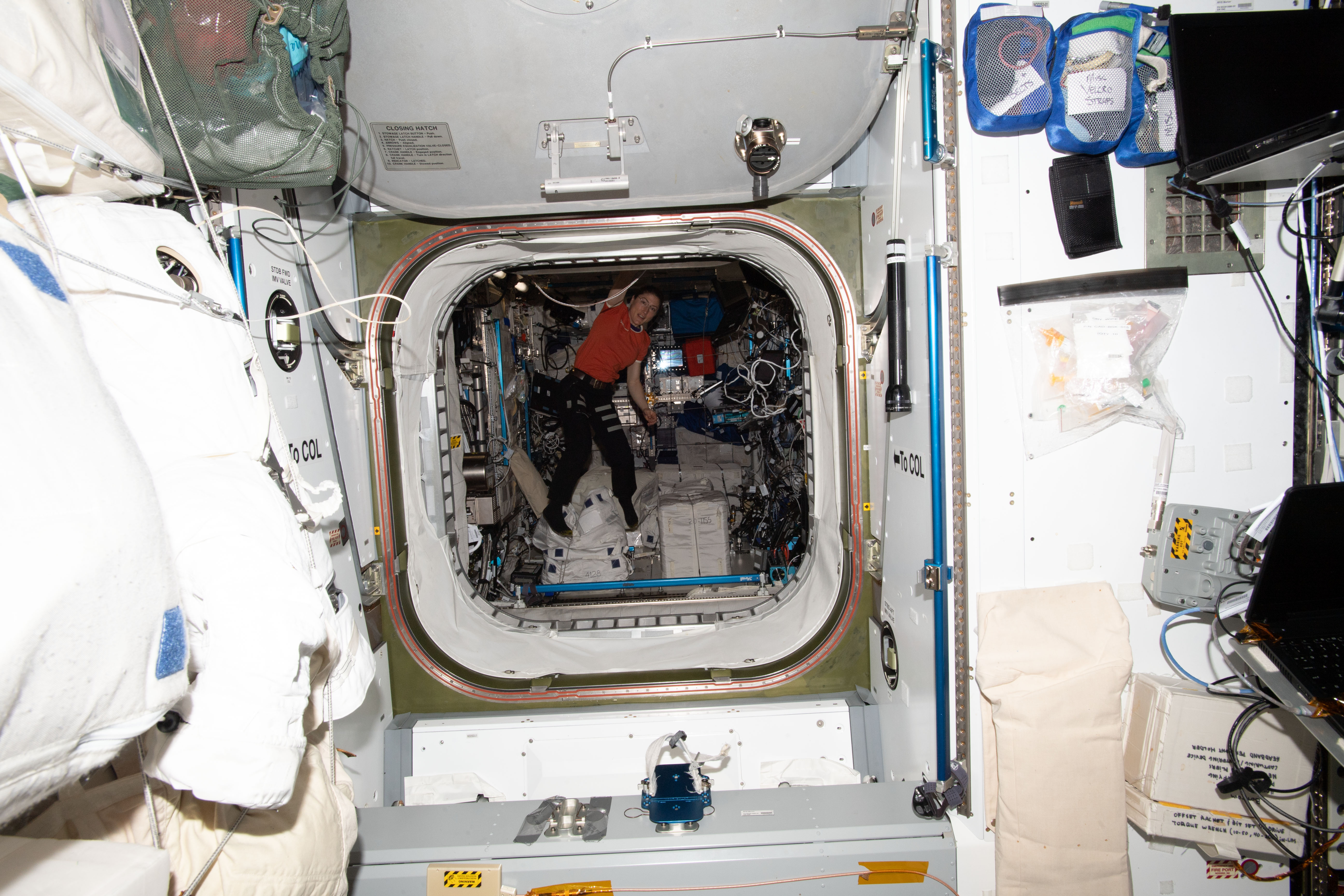 NASA astronaut and Expedition 59 Flight Engineer Christina Koch works inside the Columbus laboratory module from ESA (European Space Agency).