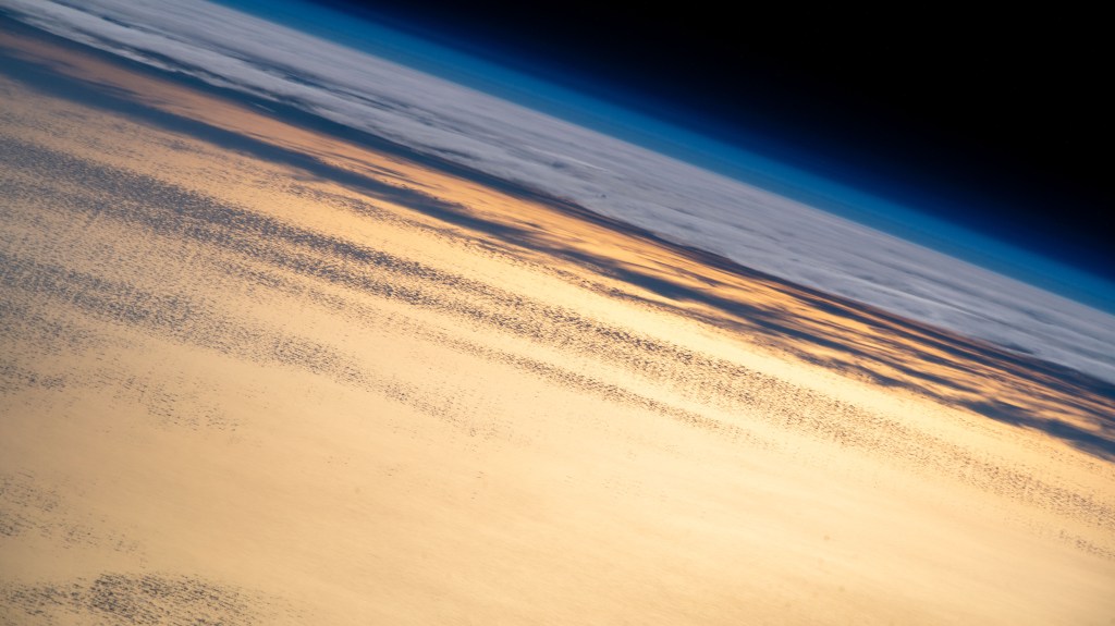 The International Space Station was flying into an orbital sunset 259 miles above the Pacific Ocean passing 550 miles off the coast of Baja California.