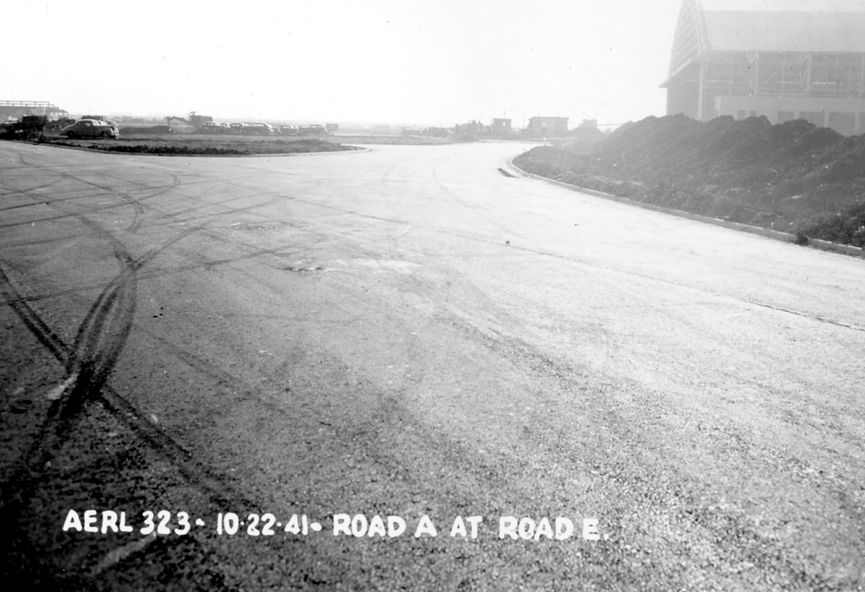 Road beside hangar.