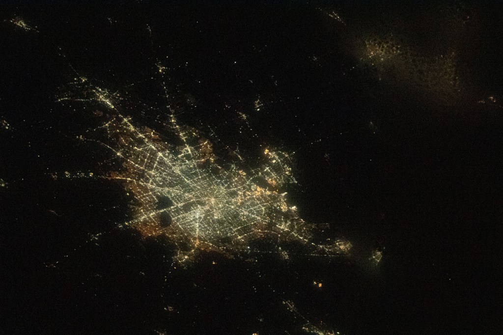 This oblique view of Houston, Texas, was taken from the International Space Station as it orbited above northern Louisiana.