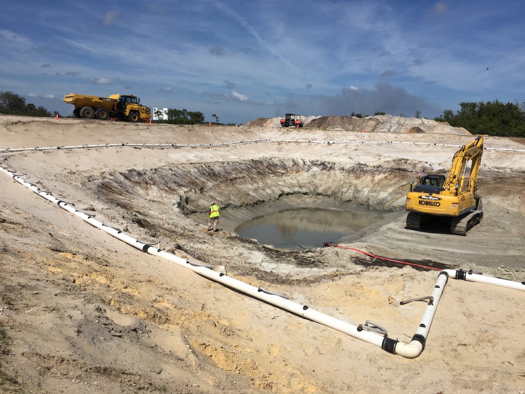 Excavator working on restoration project