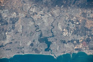 Perth, the capital of Western Australia with a population of 2.2 million on the coast of the Indian Ocean, is pictured from the International Space Station orbited 263 miles above. The Canning River merges with the Swan River before exiting into the Indian Ocean.