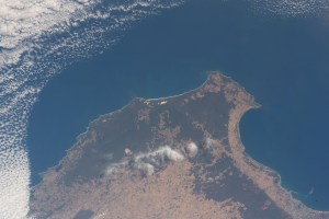 The southwestern tip of Western Australia, with its capital city of Perth at bottom right, is pictured from the International Space Station as it orbited 265 miles above the Indian Ocean off the coast of the island continent.