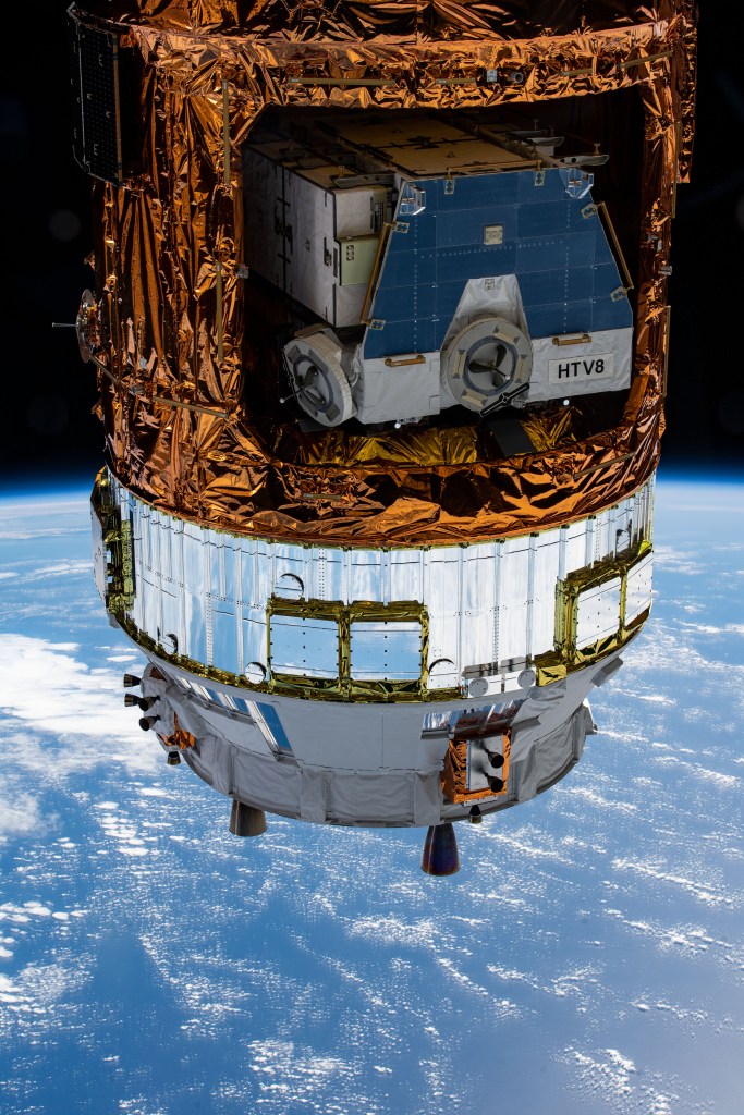 Japan's H-II Transfer Vehicle-9 (HTV-9) contains the HTV-8 pallet holding old nickel-hydrogen batteries removed from the station during previous spacewalks. The International Space Station was orbiting above the Pacific Ocean halfway between Hawaii and California when this photograph was taken by an Expedition 63 crew member.