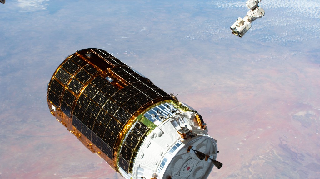 The H-II Transfer Vehicle-9 (HTV-9) from JAXA (Japan Aerospace Exploration Agency) is pictured moments before the Canadarm2 robotic arm (upper right) captured the resupply ship. Expedition 63 Commander Chris Cassidy was at the robotics controls ready to command the Canadarm2 to reach out and grapple the HTV-9 that was carrying over four tons of food, supplies and experiments to replenish the International Space Station crew.