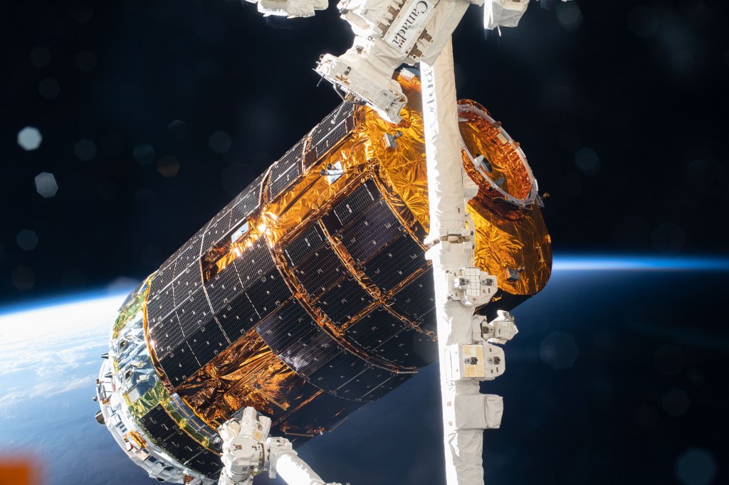 JAXA's (Japan Aerospace Exploration Agency) H-II Transfer Vehicle-9 (HTV-9) is pictured in the grips of the Canadarm2 robotic arm after its capture following a five-day trip to the International Space Station. The HTV-9 was carrying over four tons of food, supplies and experiments to replenish the Expedition 63 crew.
