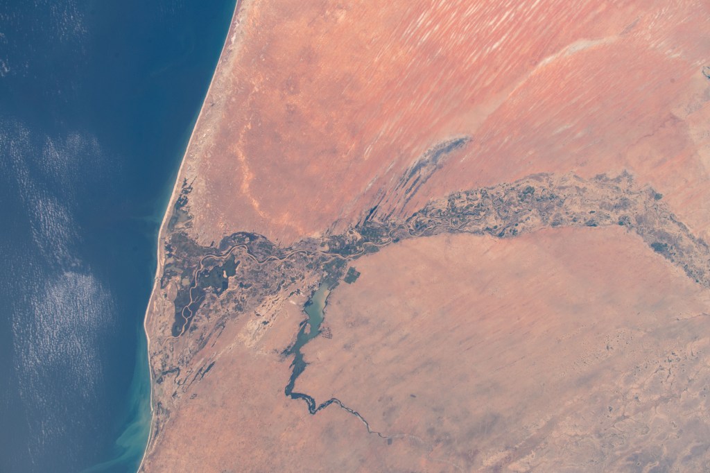 Lake Guiers and the Senegal River separating the African nations of Senegal and Mauritania are pictured as the International Space Station orbited 257 miles in altitude off the Atlantic coast.