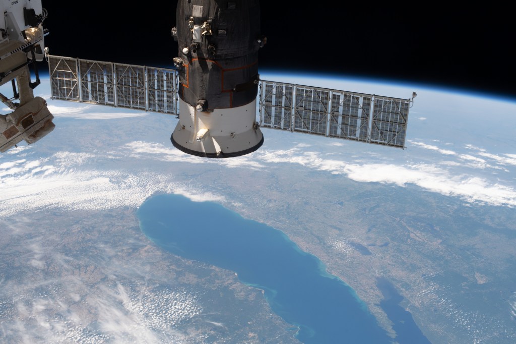 Lake Michigan figures prominently in this photograph of North America from the International Space Station with Russia's Progress 74 resupply ship in the foreground.