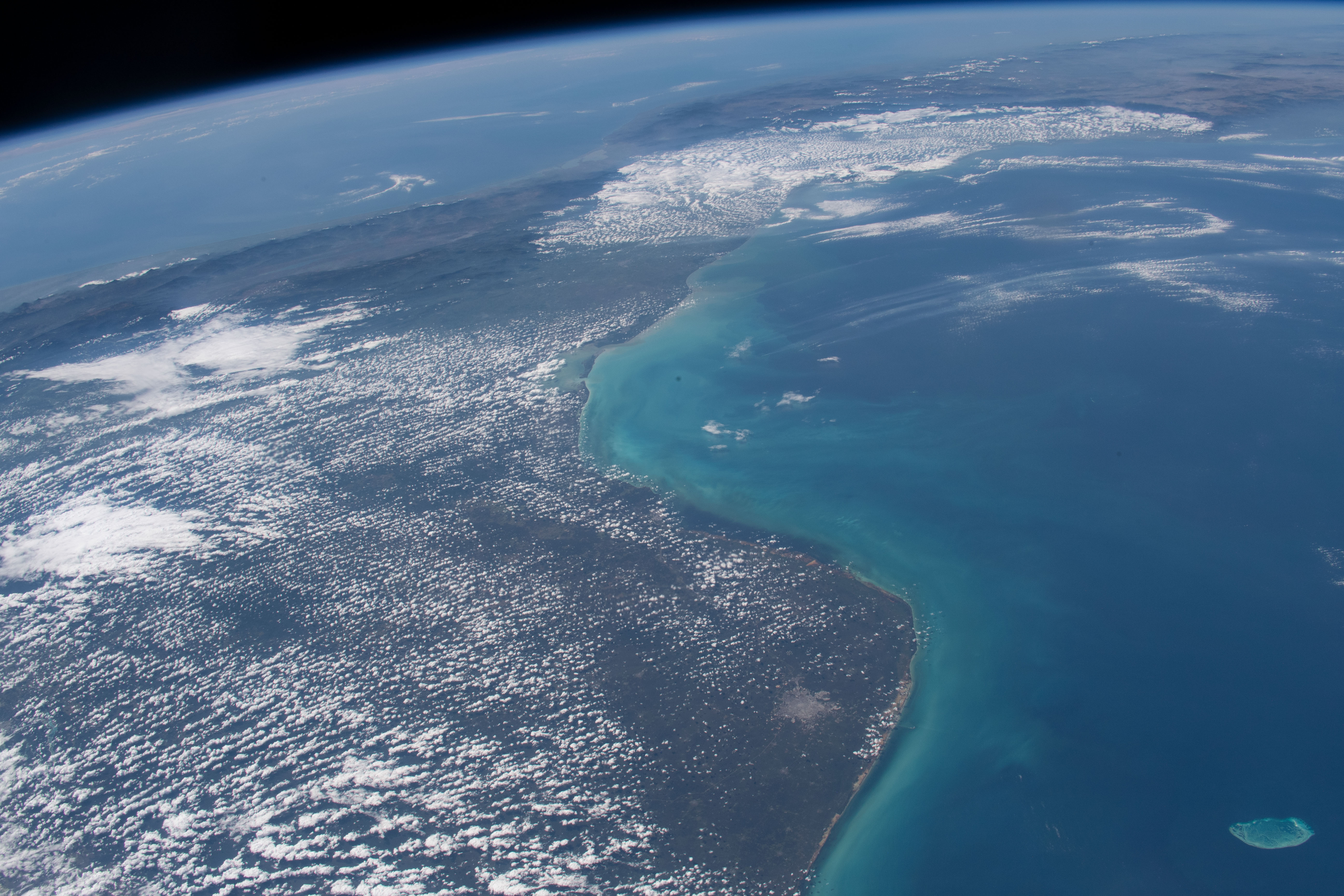 iss068e043709 (Jan. 29, 2023) --- Mexico's Yucatan Peninsula and Isla Pérez (lower right) are pictured from the International Space Station as it orbited 259 miles above the Gulf of Mexico.