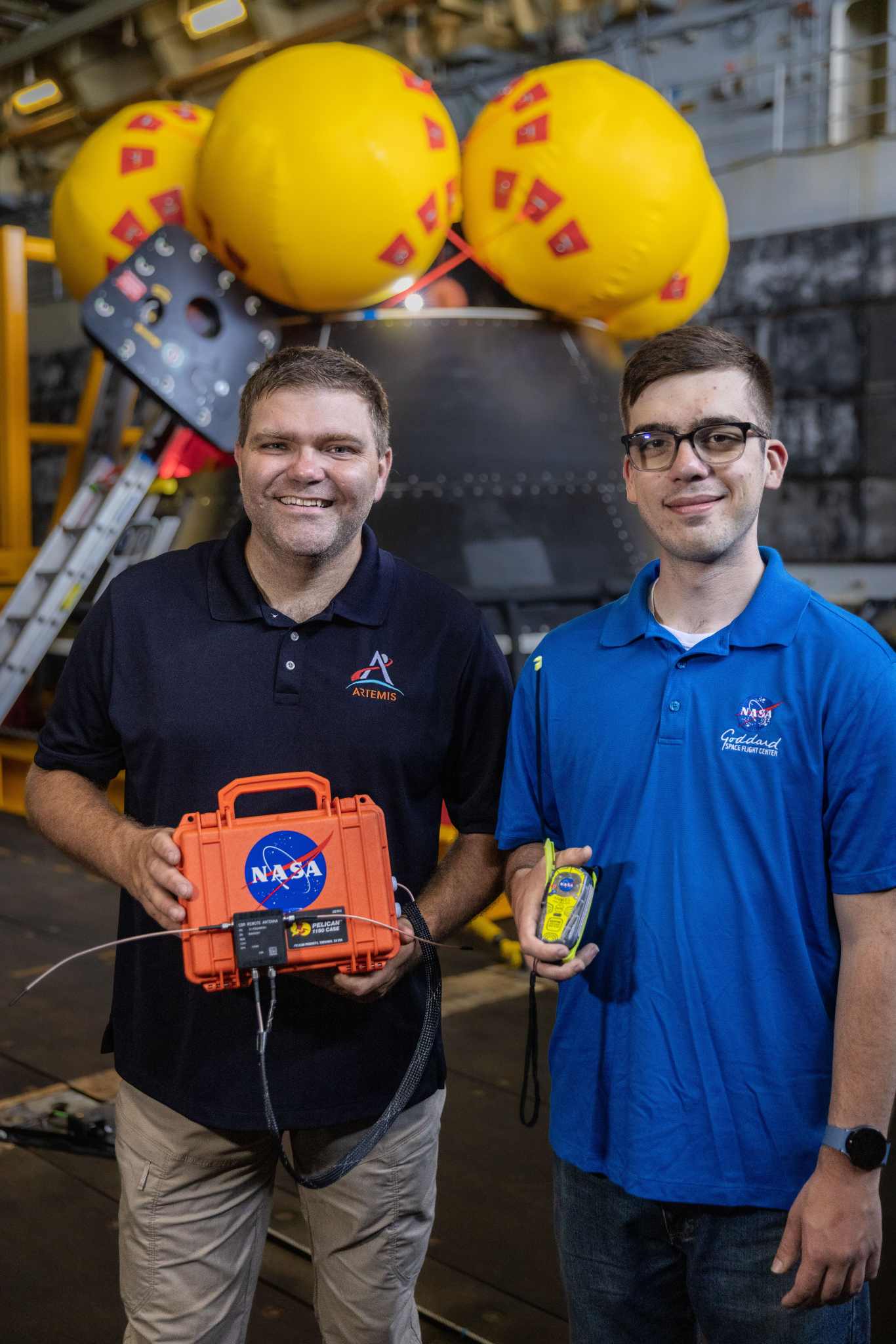 Cody Kelly and Thomas Montano from the Goddard Search and Rescue team showcasing the ANGEL beacons during Artemis testing.