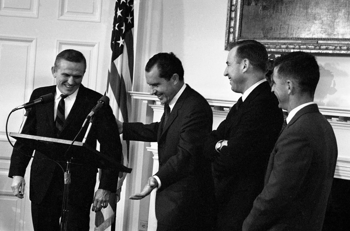 Apollo 8 astronauts Frank Borman, left, James A. Lovell, and William A. Anders with President Nixon at the White House