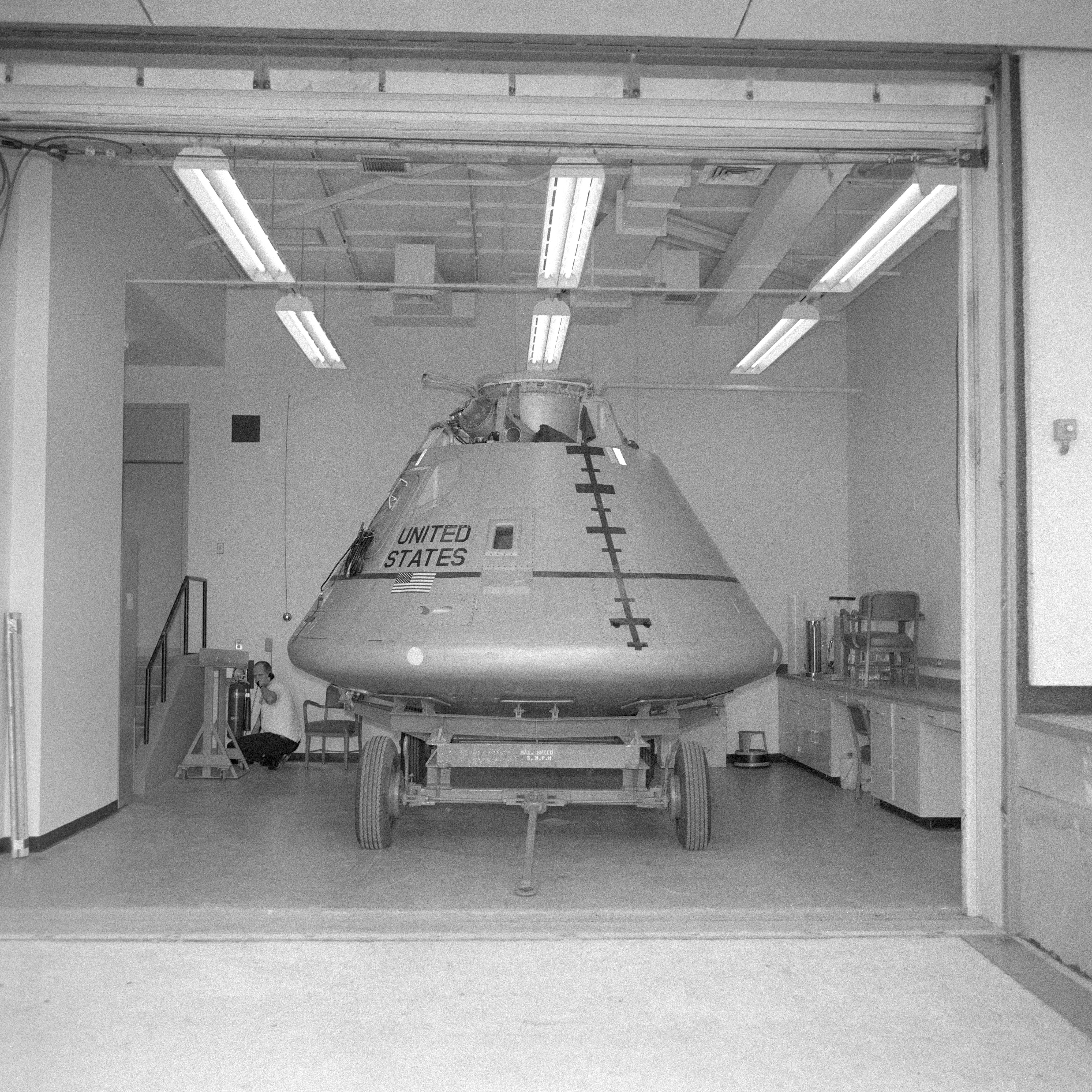 A mockup Command Module in the spacecraft storage area, part of the Crew Reception Area, in the LRL