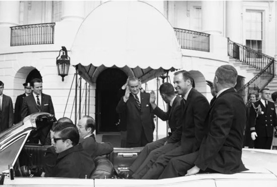 Accompanied by Vice President Hubert H. Humphrey, Borman, Lovell, and Anders take a motorcade from the White House to the Capitol