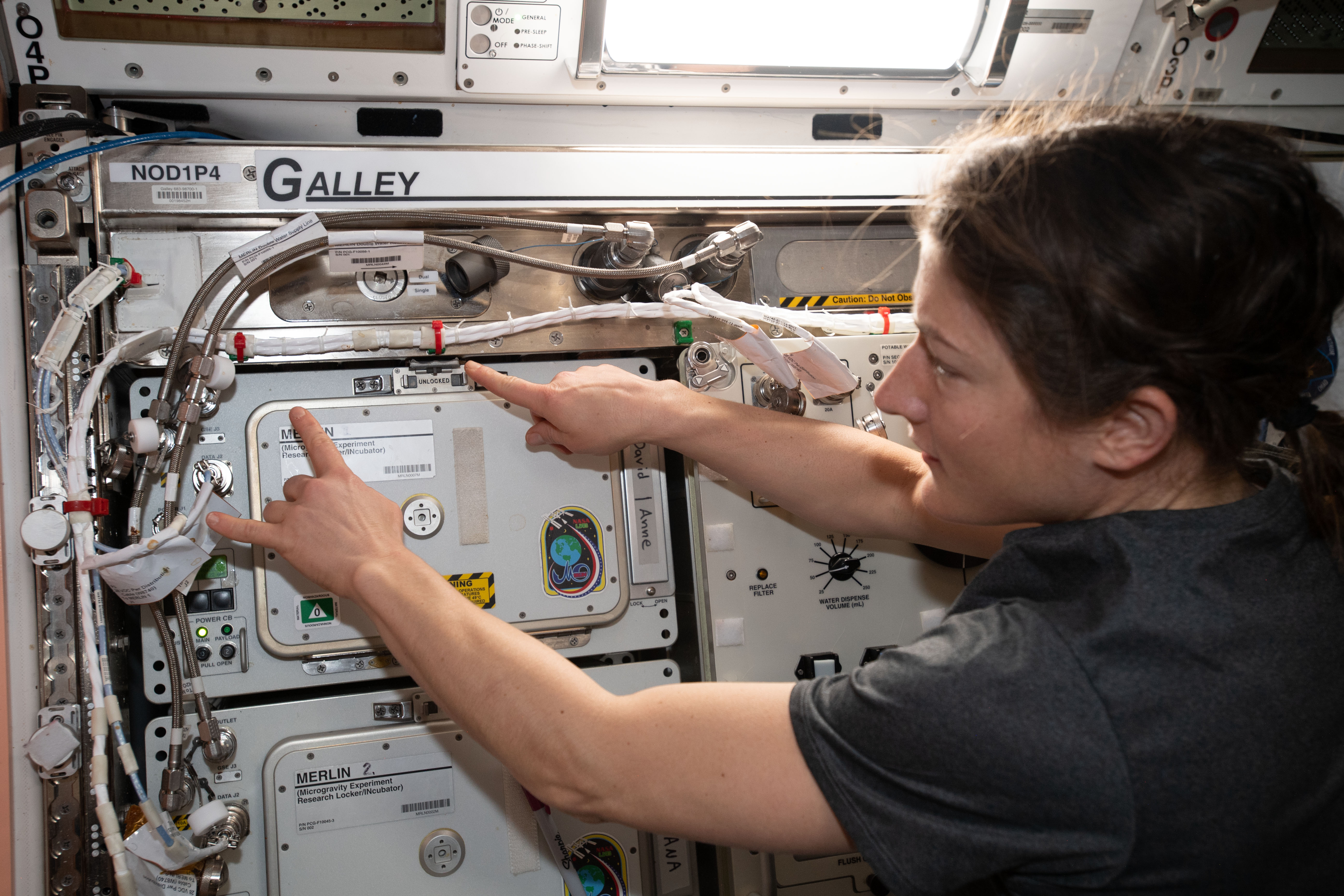 NASA astronaut and Expedition 59 Flight Engineer Christina Koch familiarizes herself with International Space Station hardware inside the Unity module.