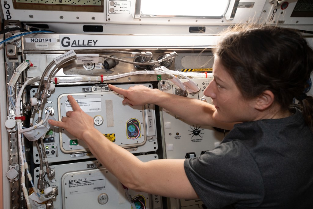NASA astronaut and Expedition 59 Flight Engineer Christina Koch familiarizes herself with International Space Station hardware inside the Unity module.