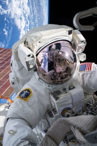 NASA astronaut Andrew Morgan conducts a spacewalk at the Port- 6 (P6) truss structure work site to upgrade International Space Station power systems. He was photographed by fellow NASA astronaut Christina Koch as they worked outside in the vacuum of space for seven hours and one minute to begin the latest round of upgrading the station's large nickel-hydrogen batteries with newer, more powerful lithium-ion batteries.