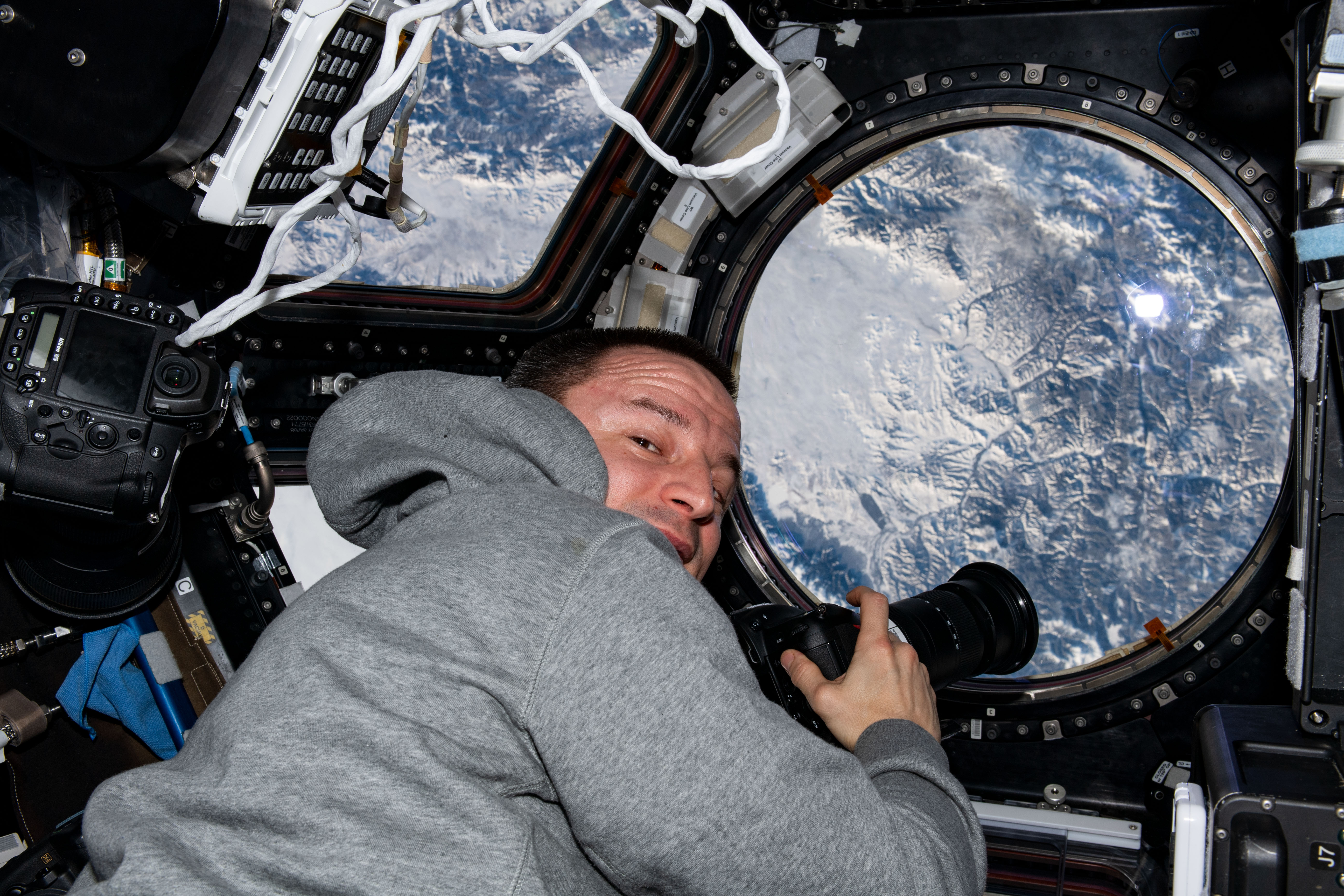 NASA astronaut and Expedition 61 Flight Engineer Andrew Morgan photographs the Earth below as the International Space Station orbited 261 miles above Russia just north of the Mongolian border.