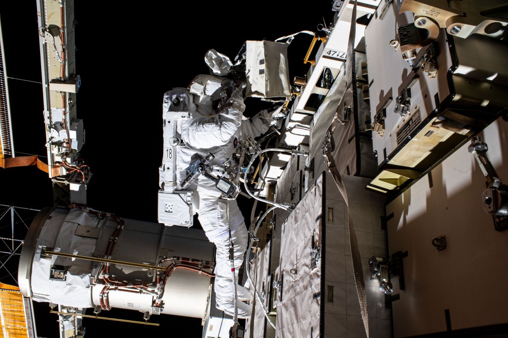 NASA astronaut Bob Behnken is pictured during a spacewalk to swap batteries and upgrade power systems on the International Space Station's Starboard-6 truss structure. Behnken was joined during the six-hour and seven-minute excursion by NASA astronaut Chris Cassidy (out of frame).