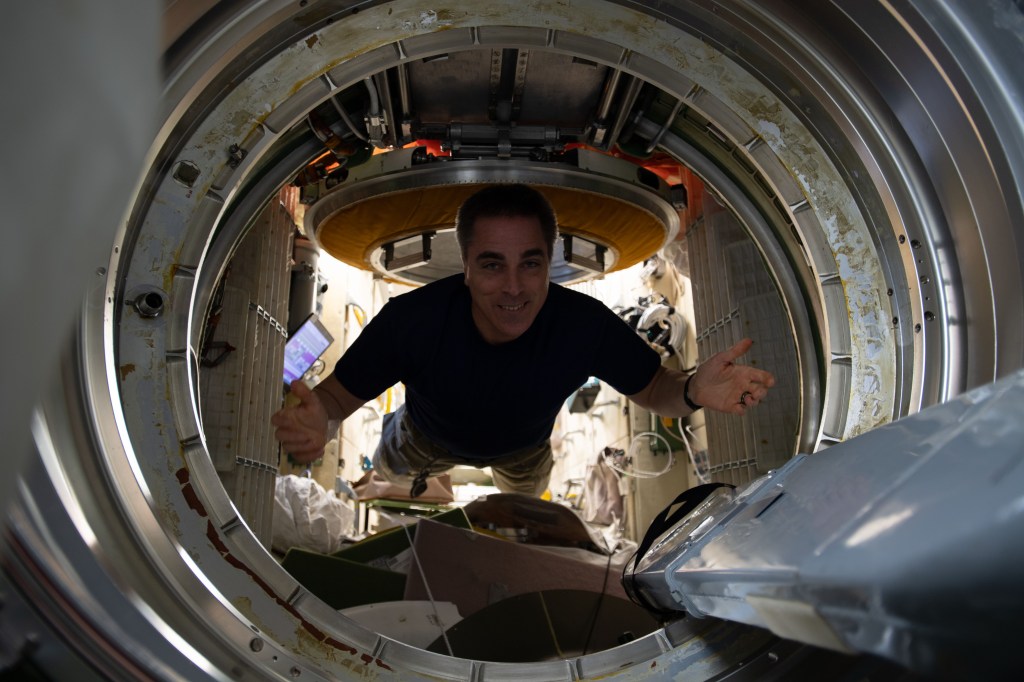 NASA astronaut Chris Cassidy enters the Soyuz MS-16 crew ship that would return him and fellow Expedition 63 crewmates Anatoly Ivanishin and Ivan Vagner, both from Roscosmos, back to Earth several hours later.