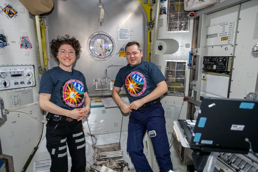 NASA astronaut Christina Koch and Roscosmos cosmonaut Oleg Skripochka are pictured in the equipment lock portion of the Quest joint airlock. The duo assisted astronauts Andrew Morgan and Luca Parmitano into their U.S. spacesuits and into the crew lock before the spacewalkers began the second spacewalk to repair the Alpha Magnetic Spectrometer's thermal control system.