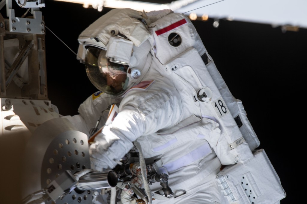NASA astronaut Christina Koch conducts her fourth spacewalk at the International Space Station. She and fellow NASA astronaut Jessica Meir (out of frame) ventured into the vacuum of space for seven hours and 17 minutes to swap a failed battery charge-discharge unit (BCDU) with a spare during the first all-woman spacewalk. The BCDU regulates the charge to the batteries that collect and distribute solar power to the orbiting lab’s systems.