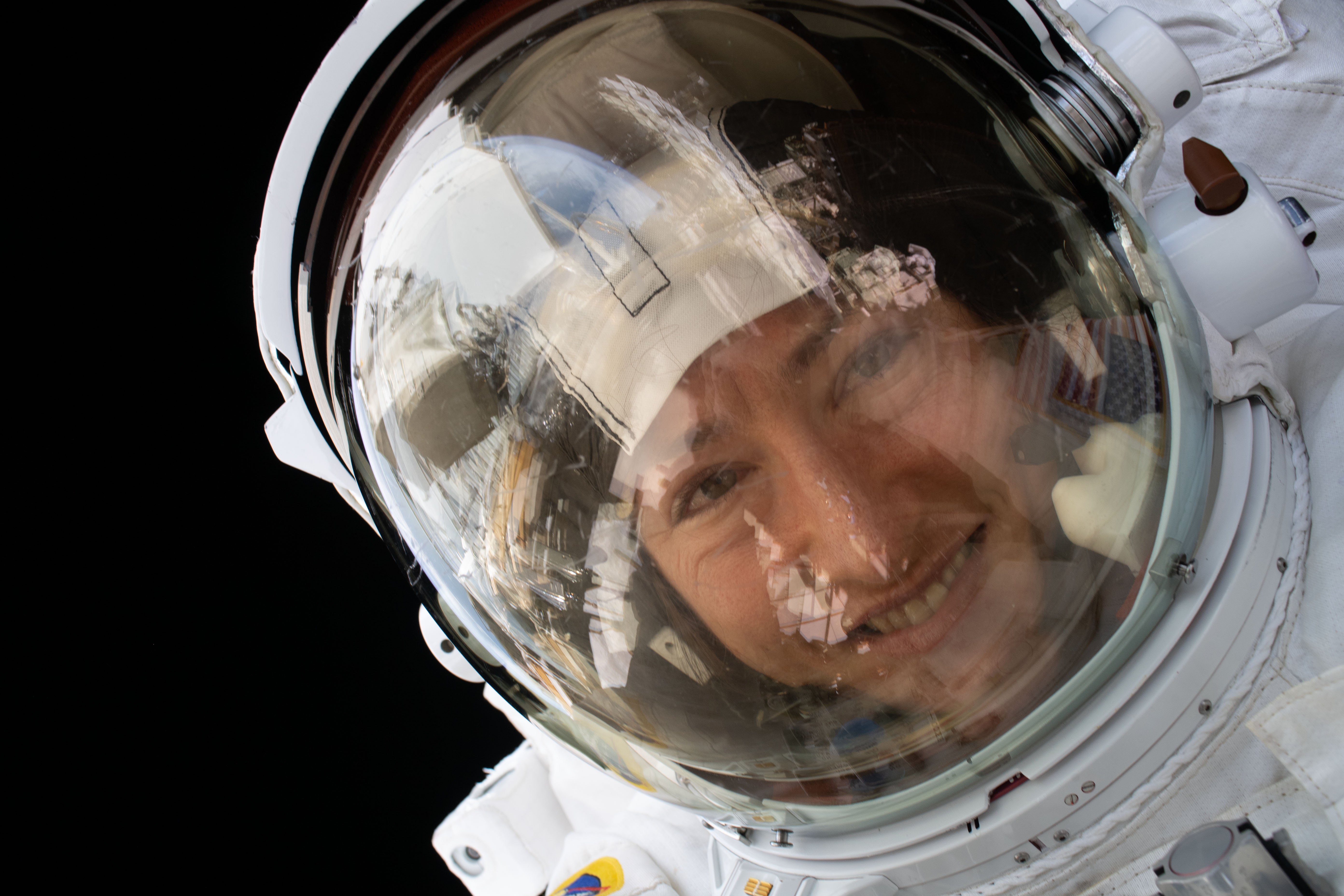 NASA astronaut Christina Koch is pictured during a spacewalk she conducted with NASA astronaut Jessica Meir (out of frame) to install new lithium-ion batteries that store and distribute power collected from solar arrays on the station’s Port-6 truss structure.