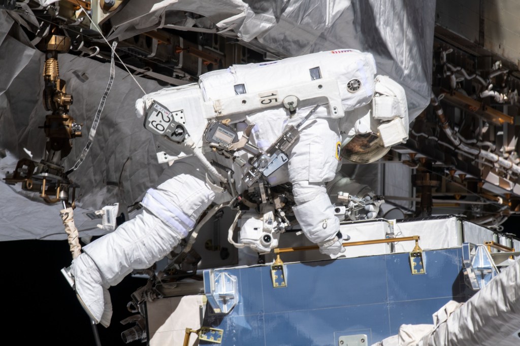 NASA astronaut Christina Koch works while tethered near the Port 6 truss segment of the International Space Station to replace older hydrogen-nickel batteries with newer, more powerful lithium-ion batteries. Fellow NASA astronaut Andrew Morgan (out of frame) assisted Koch during the six-hour and 45-minute spacewalk.