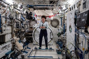 NASA astronaut Jessica Meir, attached to foot restraints inside the Kibo laboratory module from JAXA (Japan Aerospace Exploration Agency), participates in interviews with journalists from Bangor, Maine and Boston, Massachusetts.