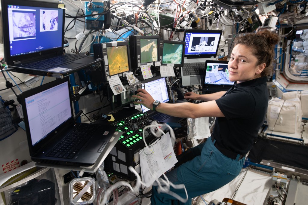 NASA astronaut Jessica Meir is at the robotics workstation controlling the Canadarm2 robotic arm to support the first spacewalk to repair the Alpha Magnetic Spectrometer (AMS), the International Space Station's cosmic particle detector. Astronauts Luca Parmitano of ESA (European Space Agency) and Andrew Morgan of NASA worked six hours and 39 minutes in the vacuum of space during the first of at least four planned AMS repair spacewalks.