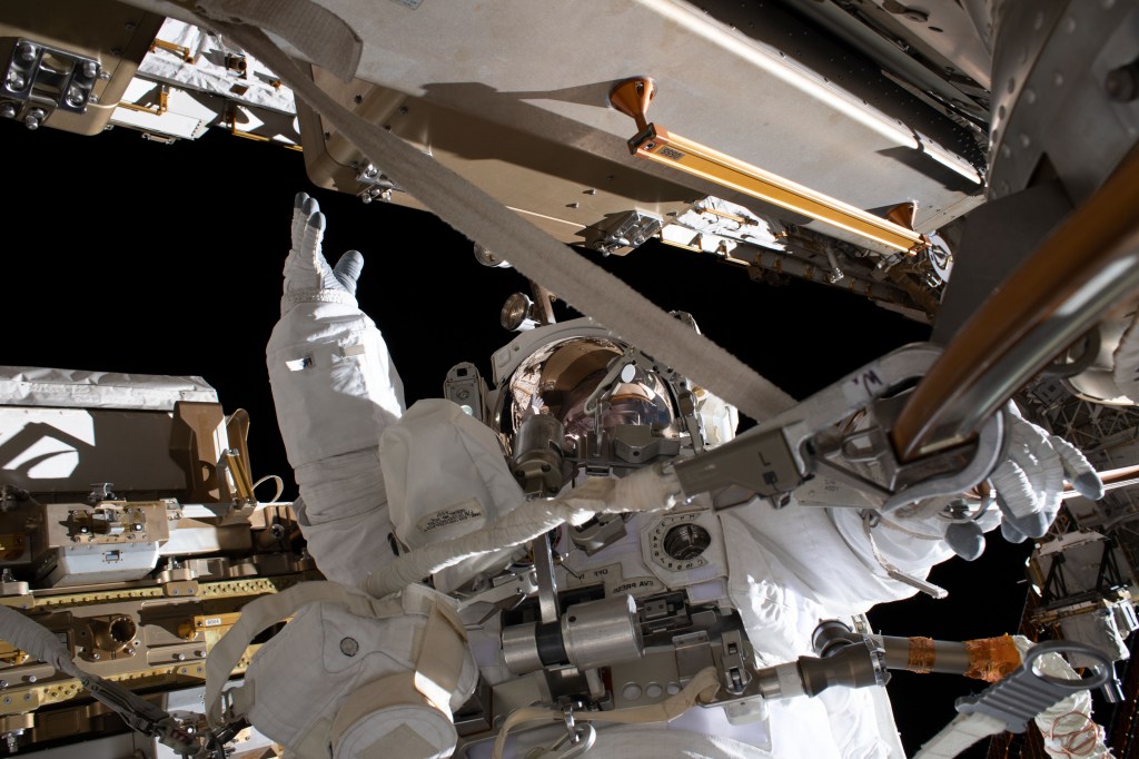 NASA astronaut Jessica Meir is pictured during a spacewalk with fellow NASA astronaut Christina Koch (out of frame). They ventured into the vacuum of space for seven hours and 17 minutes to swap a failed battery charge-discharge unit (BCDU) with a spare during the first all-woman spacewalk. The BCDU regulates the charge to the batteries that collect and distribute solar power to the orbiting lab’s systems.