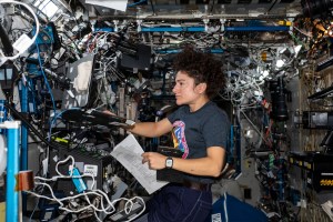 NASA astronaut Jessica Meir reviews robotics procedures in the U.S. Destiny laboratory module. She will operate the Canadarm2 robotic arm to support a series of spacewalks by astronauts Luca Parmitano and Andrew Morgan to repair the International Space Station's cosmic particle detector, the Alpha Magnetic Spectrometer (AMS).