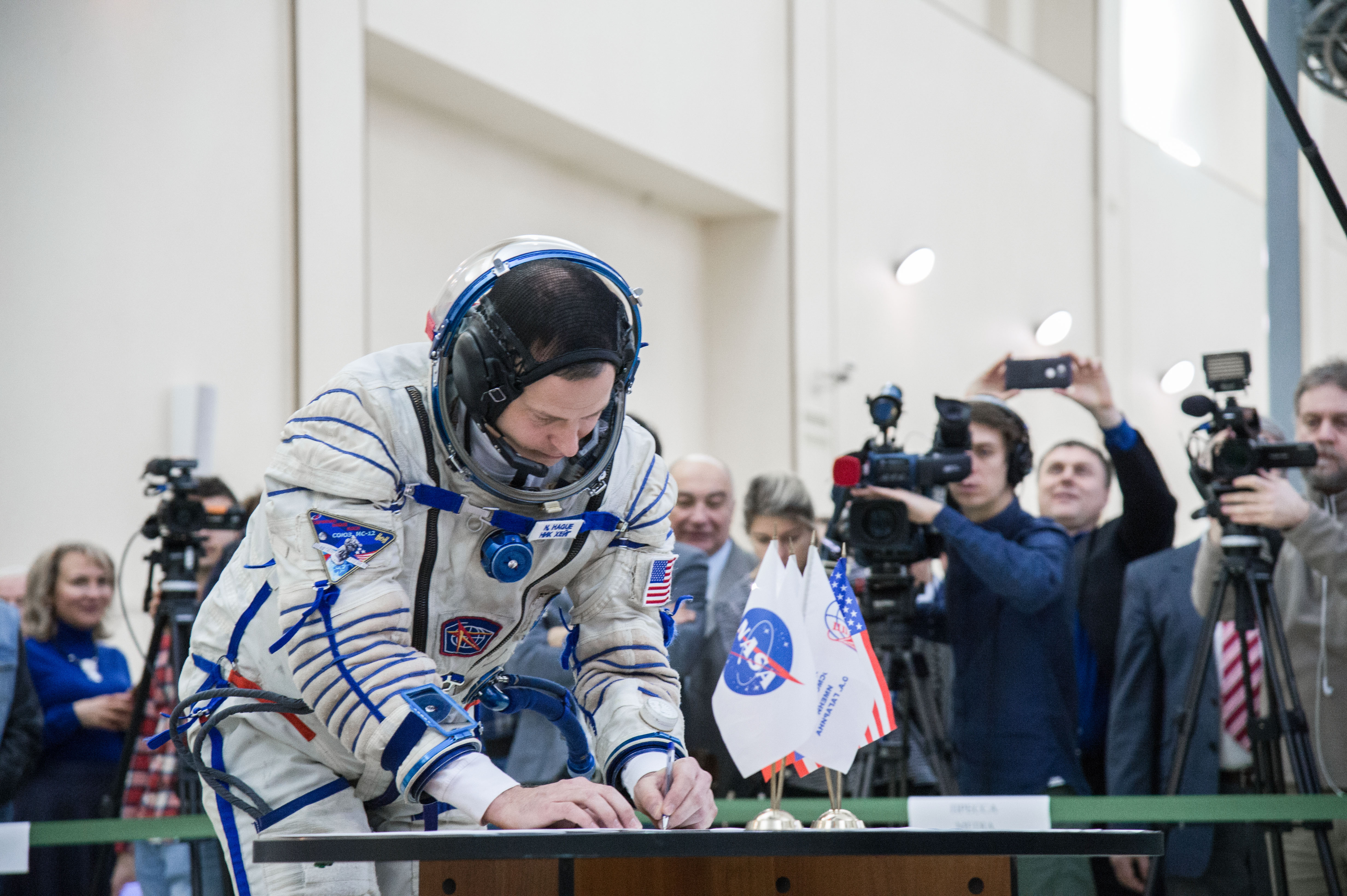 At the Gagarin Cosmonaut Training Center in Star City, Russia, Expedition 59 crew member Nick Hague of NASA signs in for the second day of final pre-launch qualification exams Feb. 20. Hague, Christina Koch of NASA and Alexey Ovchinin of Roscosmos will launch March 14, U.S. time, in the Soyuz MS-12 spacecraft from the Baikonur Cosmodrome in Kazakhstan for a six-and-a-half month mission on the International Space Station.