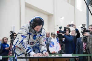 At the Gagarin Cosmonaut Training Center in Star City, Russia, Expedition 59 crew member Nick Hague of NASA signs in for the second day of final pre-launch qualification exams Feb. 20. Hague, Christina Koch of NASA and Alexey Ovchinin of Roscosmos will launch March 14, U.S. time, in the Soyuz MS-12 spacecraft from the Baikonur Cosmodrome in Kazakhstan for a six-and-a-half month mission on the International Space Station.