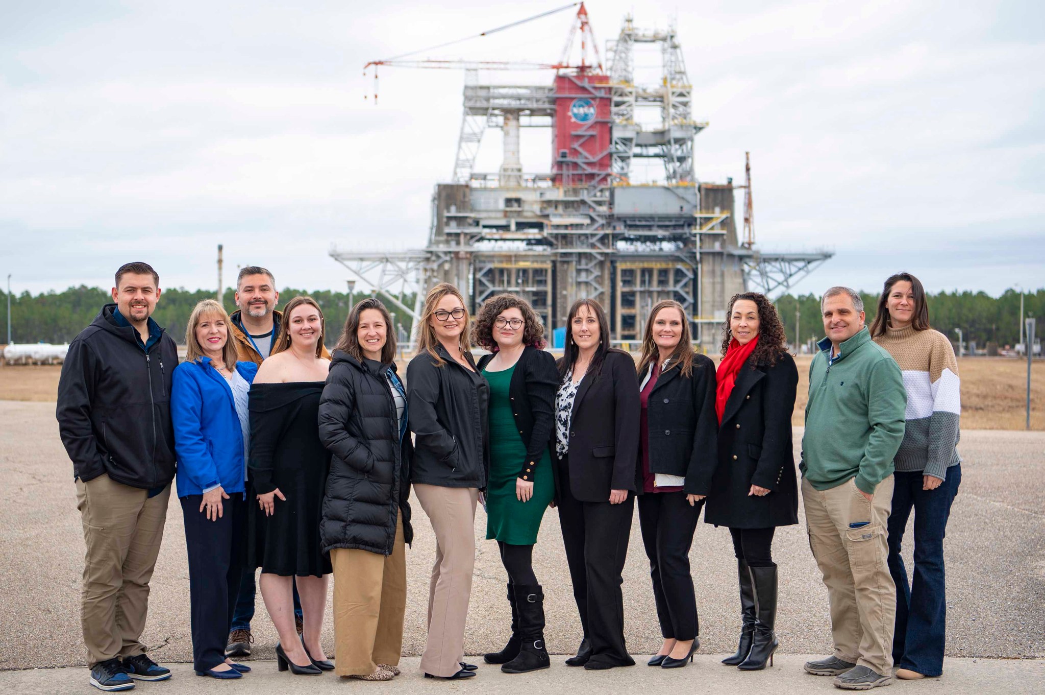 The Pearl River County Leadership Class stands in front of the Thad Cochran Test Stand