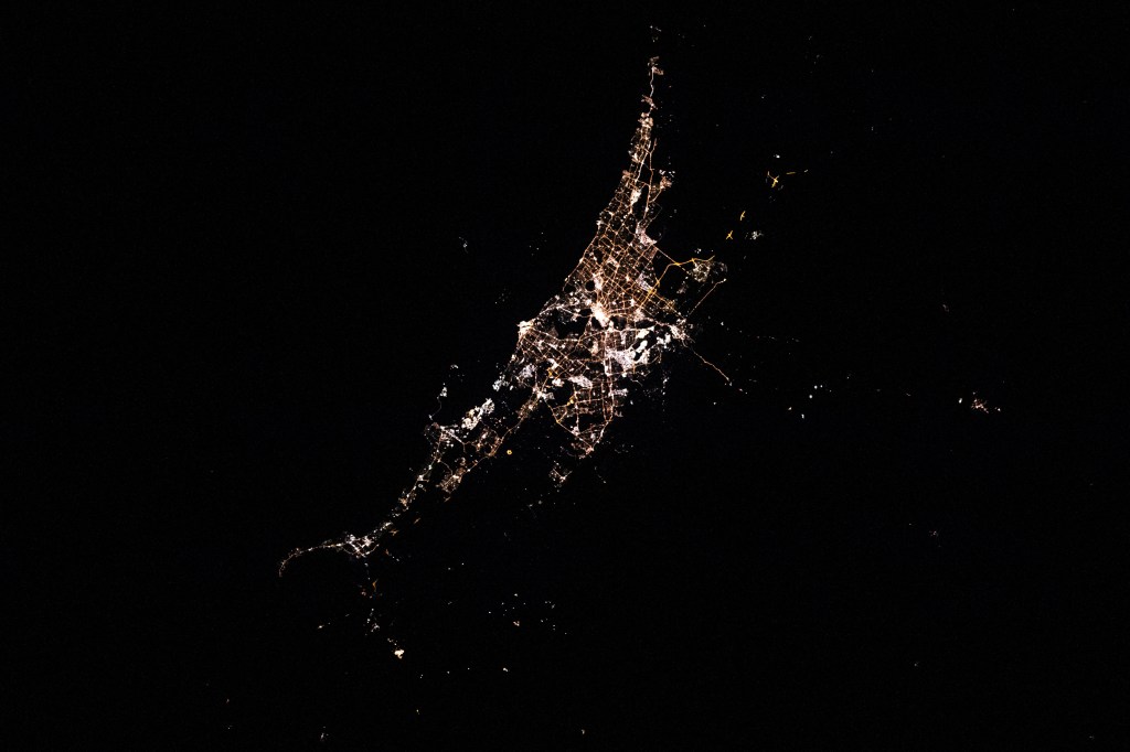 Perth, Australia is pictured from the International Space Station as it orbited west of the city above the Indian Ocean during an orbital night period.