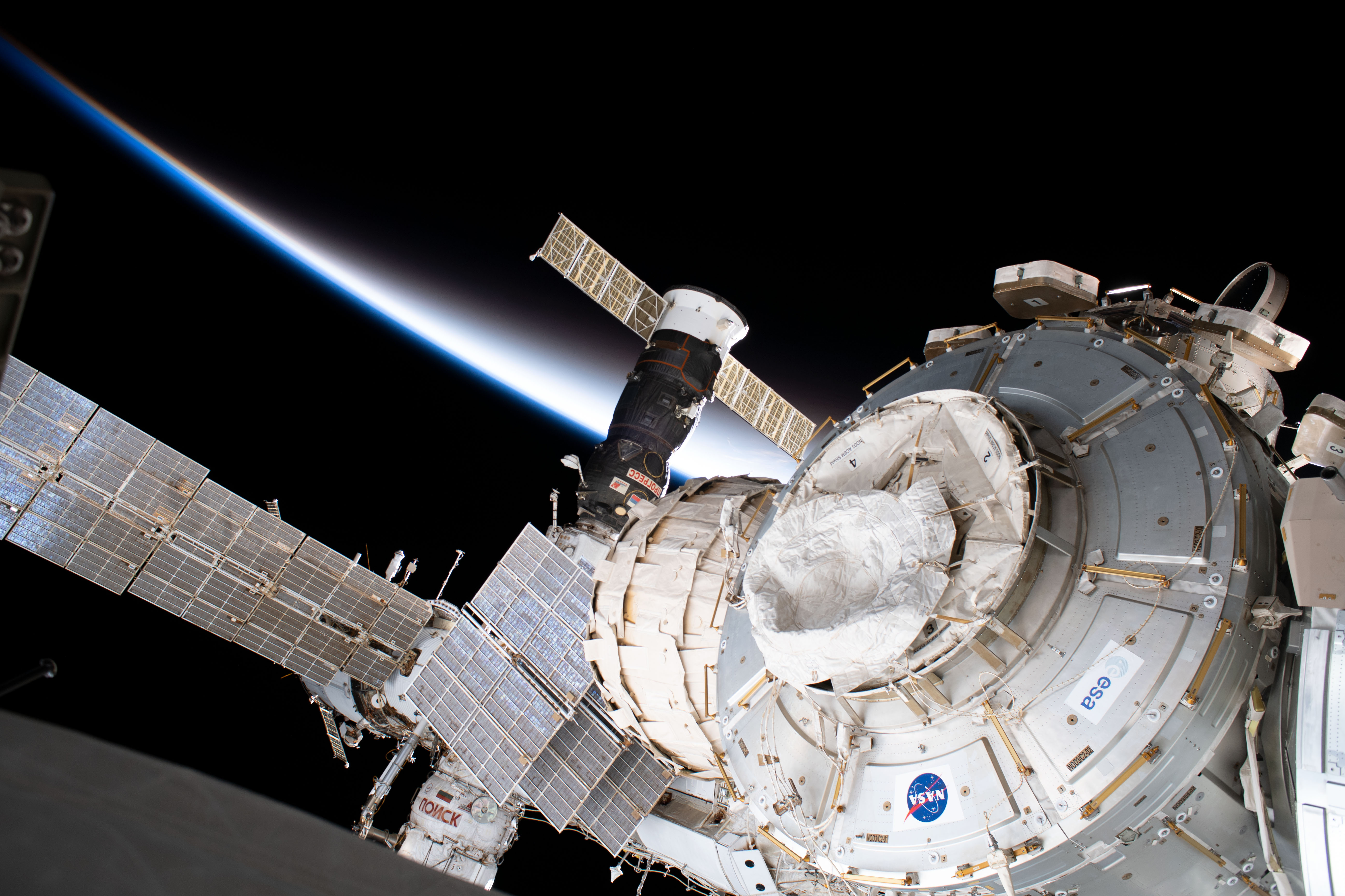 Portions of the International Space Station are pictured as the orbiting complex was flying into an orbital sunset. From front to back, are the Tranquility module, the Bigelow Expandable Activity Module (BEAM), the Progress 73 resupply ship and (at bottom) the Rassvet mini-research module.