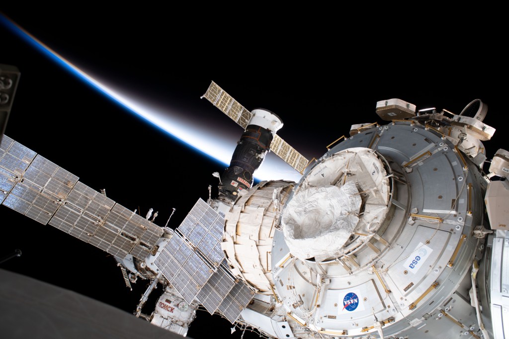 Portions of the International Space Station are pictured as the orbiting complex was flying into an orbital sunset. From front to back, are the Tranquility module, the Bigelow Expandable Activity Module (BEAM), the Progress 73 resupply ship and (at bottom) the Rassvet mini-research module.