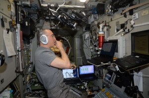 Roscosmos Flight Engineer Anatoly Ivanishin practices a simulated emergency evacuation of the International Space Station on a computer inside the Zvezda service module. Ivanishin spent the afternoon reviewing procedures for quickly entering the Soyuz MS-16 crew ship for a rapid undocking and Earth re-entry with crewmates Ivan Vagner of Roscosmos and Chris Cassidy of NASA (both out of frame).