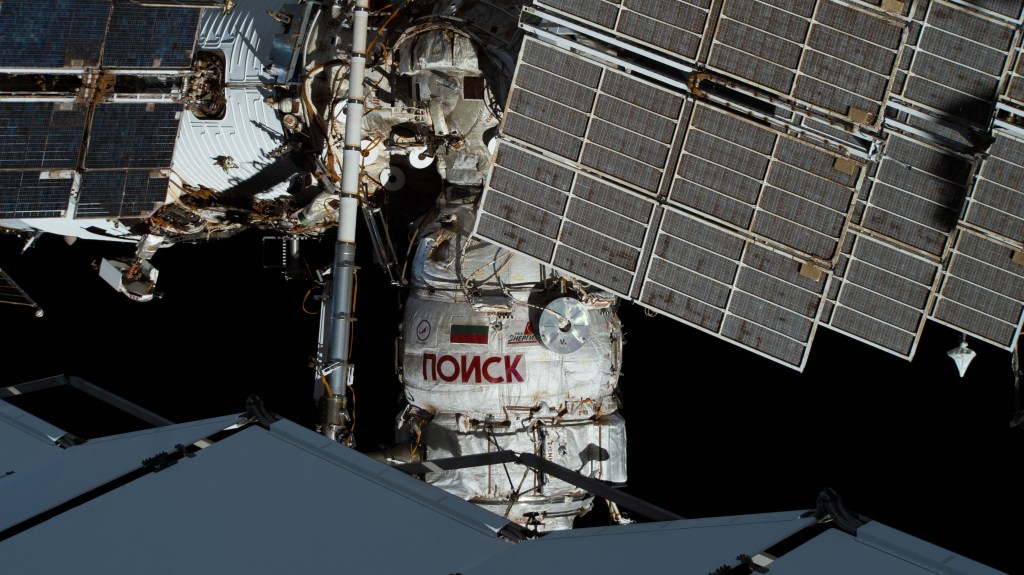 Russia's Mini-Research Module 2, also known as the Poisk module, is pictured from an external high definition camera installed on the International Space Station. Poisk was attached to the space-facing port of the Zvezda service module in November of 2009 and has served as a docking port for Soyuz crew ships. It also provides a place to prepare for spacewalks, as well the refurbishing of the Russian Orlan spacesuits. The module from Roscosmos has the added bonus of extra space for scientific experiments, as well as power supply outlets. It is also equipped with both internal and external workstations to accommodate science payloads and make observations.
