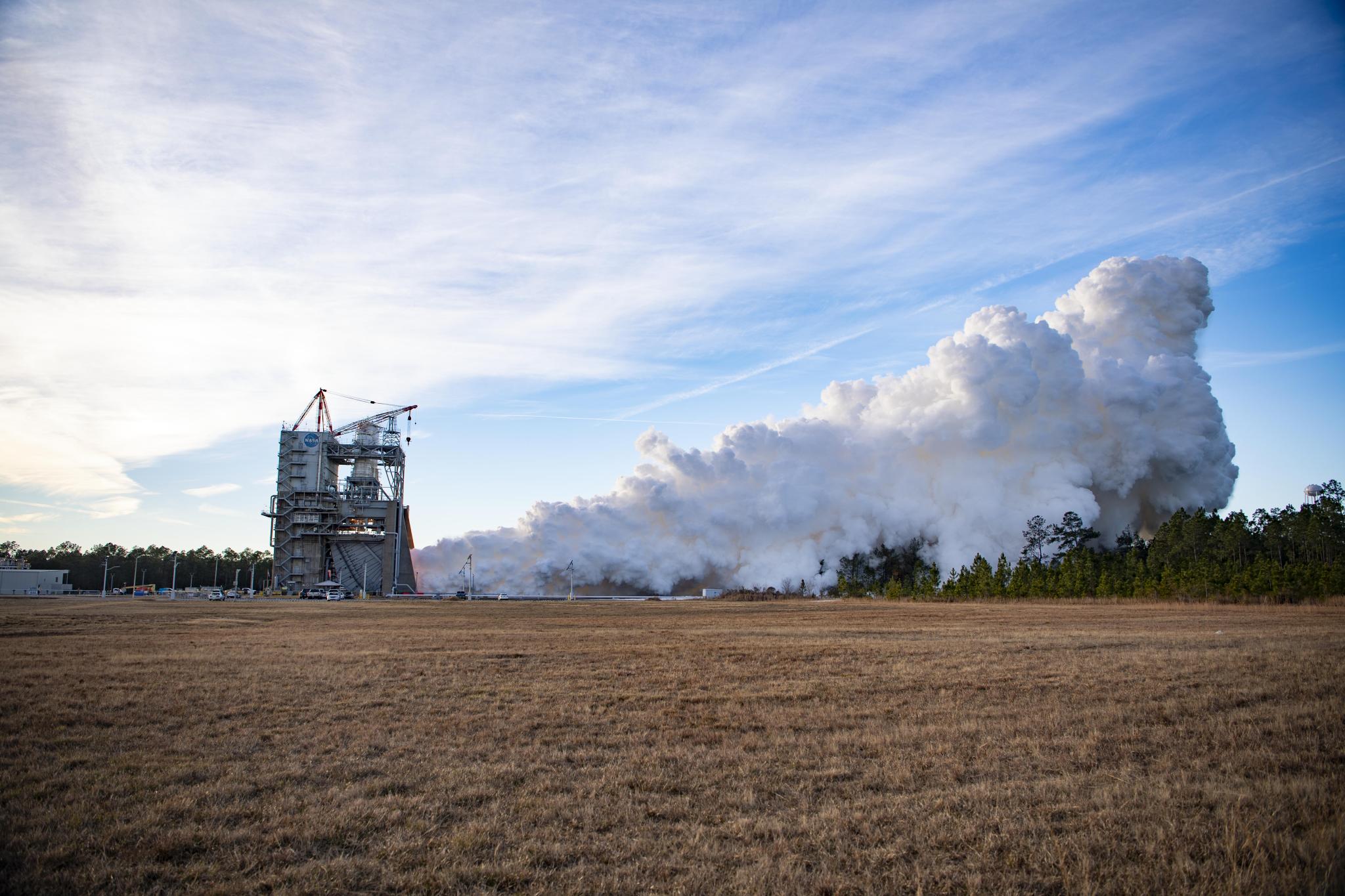 distant view of a hot fire of an RS-25 certification engine