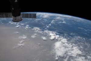What looks like land is actually a Saharan dust cloud that has blown over the Atlantic Ocean and is nearing the Caribbean Sea.