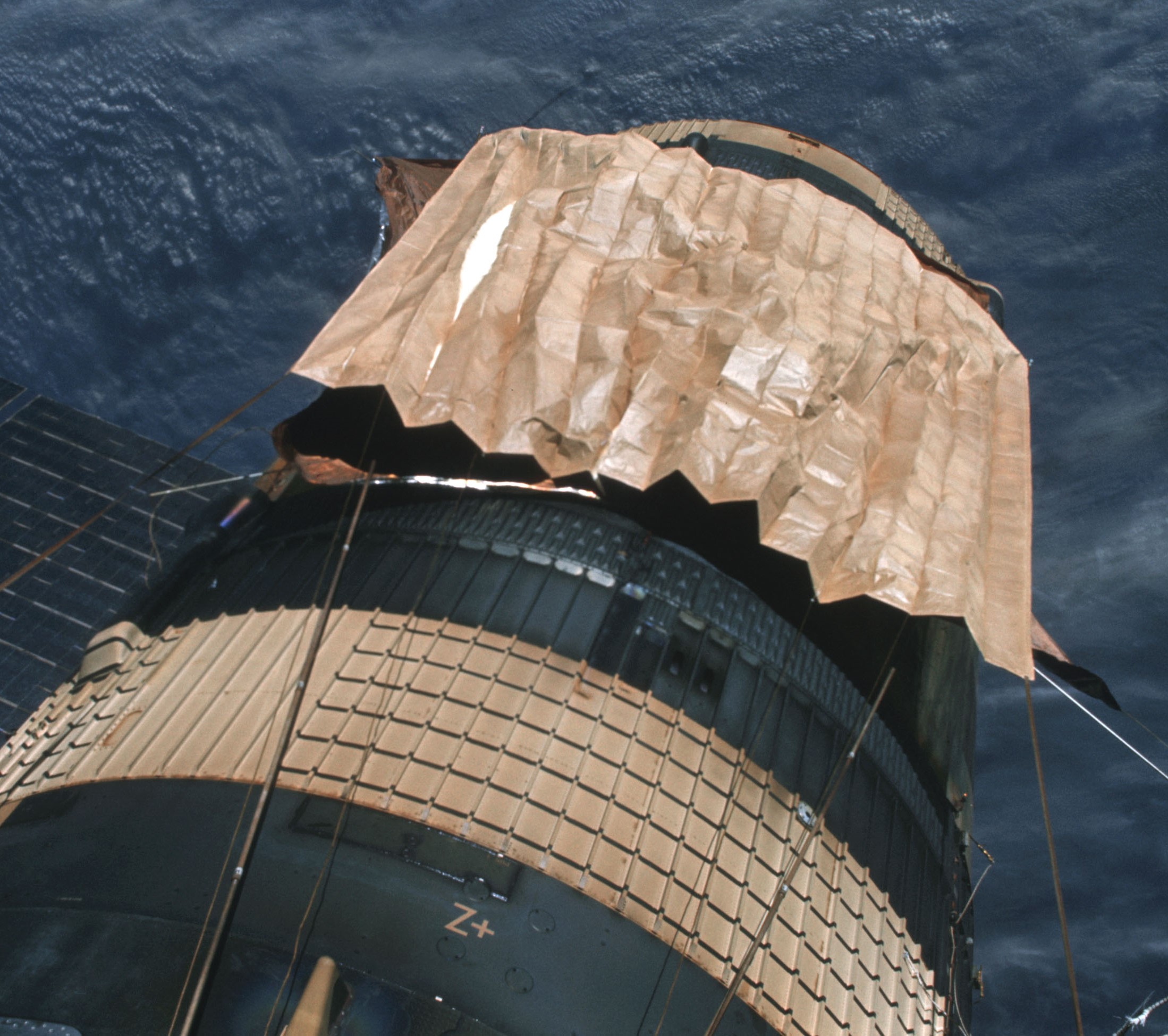 The second sunshield deployed by the Skylab 3 crew showing evidence of discoloration