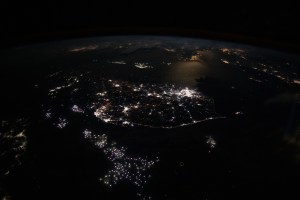 The lights of South Korean cities and fishing boats on the Sea of Japan and the Yellow Sea are pictured as the International Space Station orbited 260 miles in altitude off the coast of Japan near Hiroshima. The brightest city lights toward the center represent the South Korean capital city of Seoul.