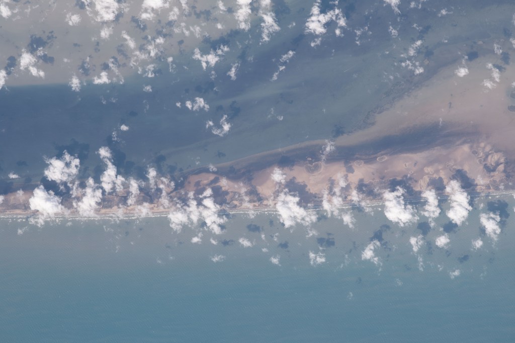 The International Space Station was orbiting over Texas and into Mexico when this photograph was taken of South Padre Island, part of the Lower Rio Grande Valley National Wildlife Refuge.